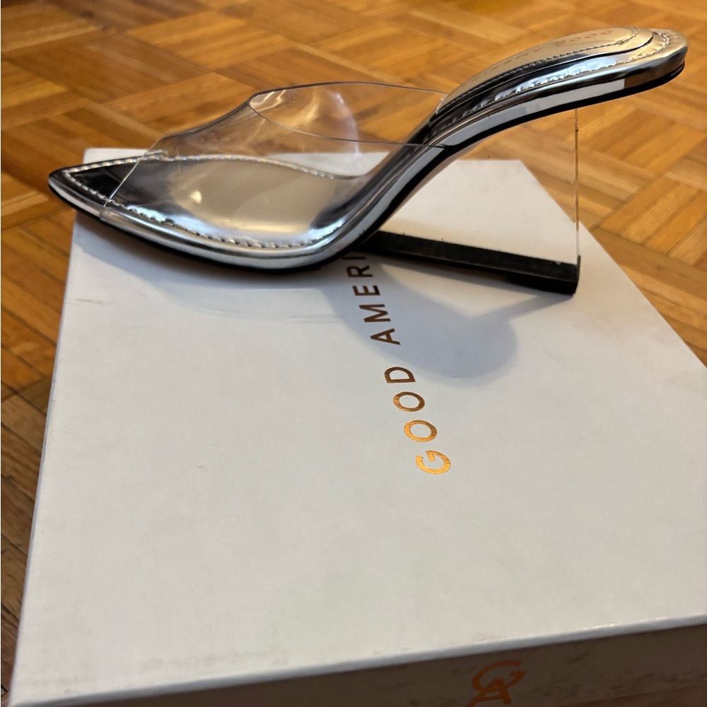 Good American sandals with clear strap and clear wedge heel